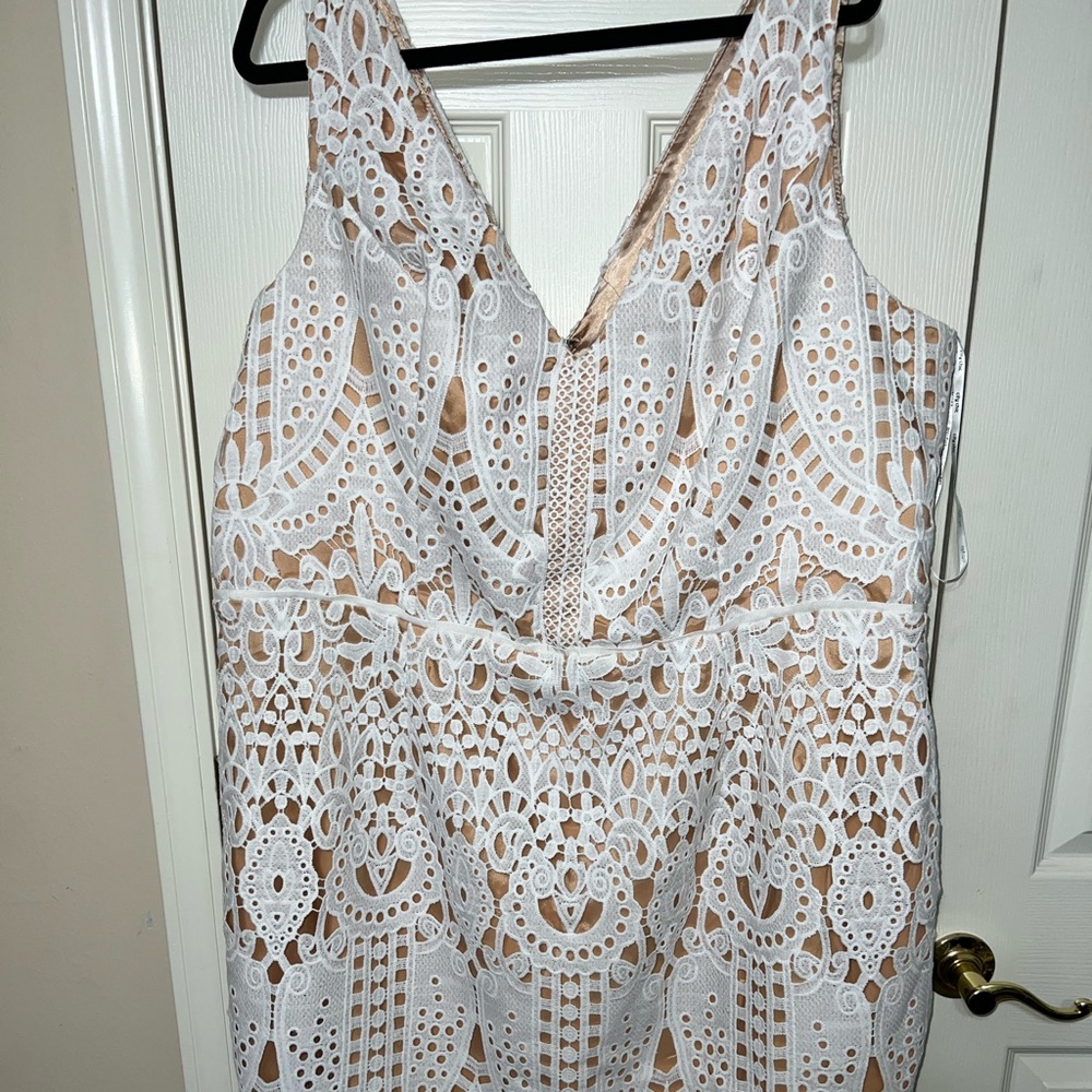 Beautiful white dress with nude lining.